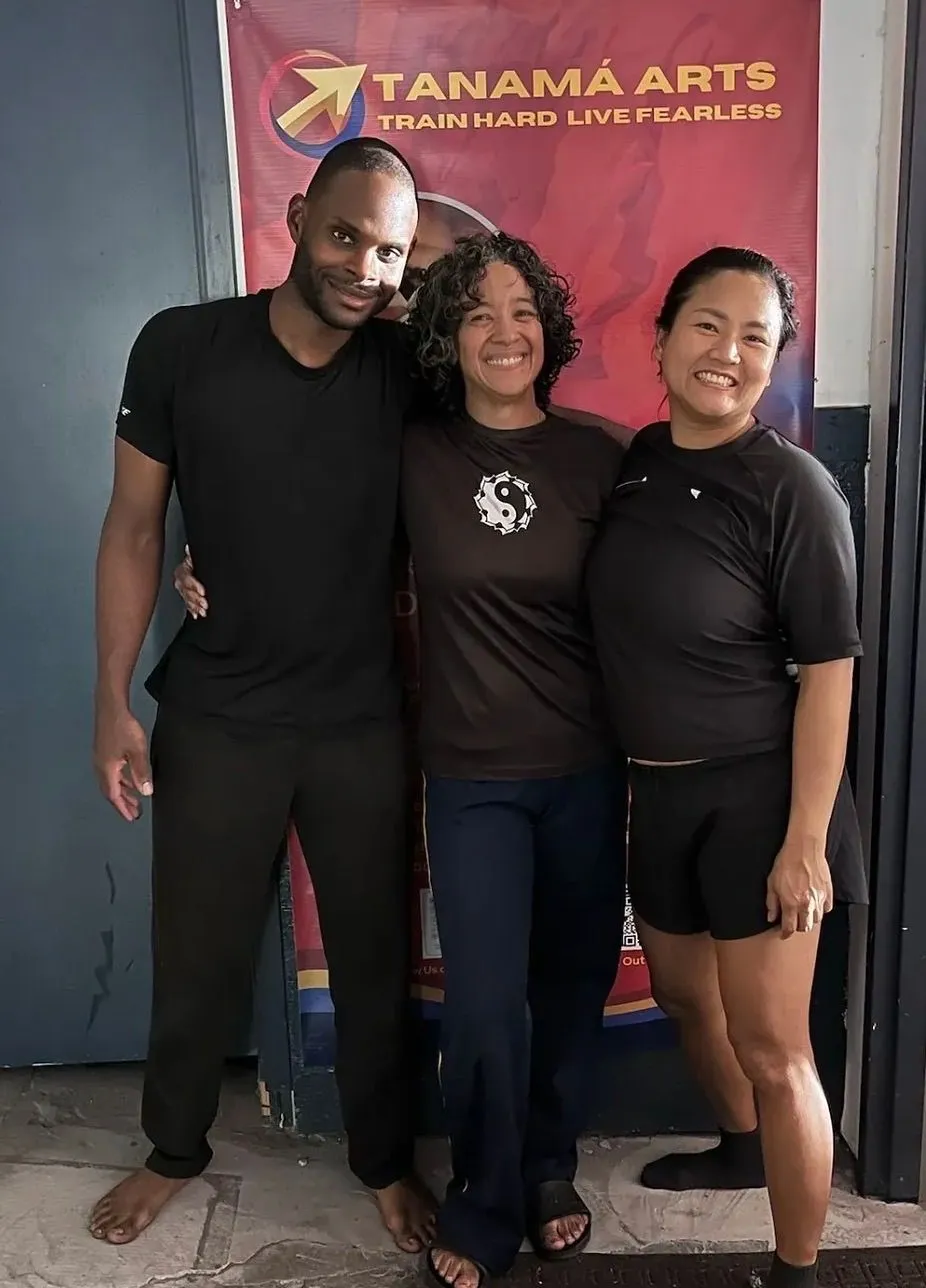 FitSquad martial arts instructor with two students at Tanama Arts